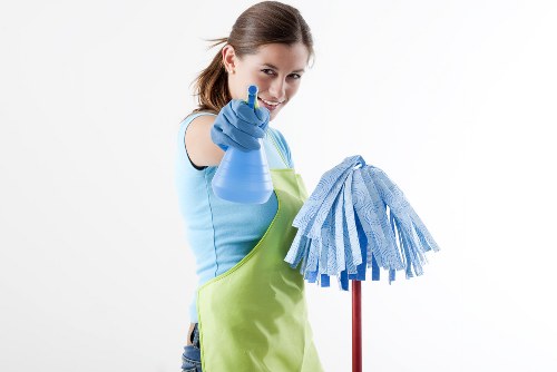 Workers and cleaning equipment representing ethical labour practices