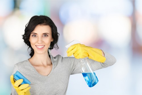 Professional carpet cleaner handling equipment during service